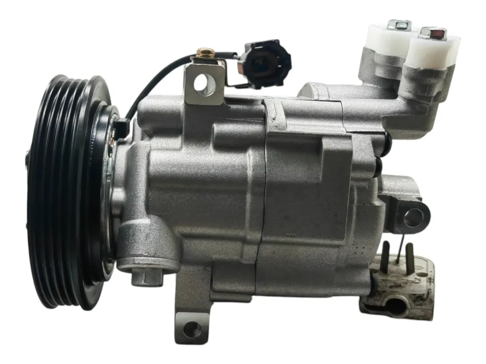 Компpeccор кондиционерa Nissan Micra K12