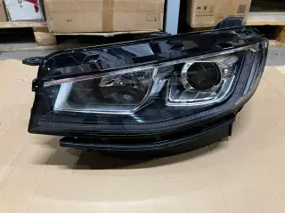 Фара головного света левая галоген Geely Atlas Pro